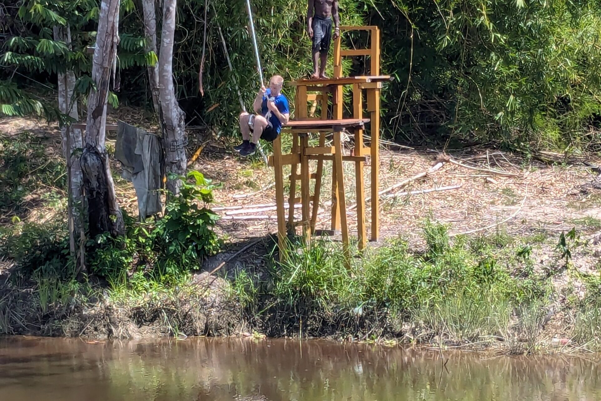Tarzan swing into the water